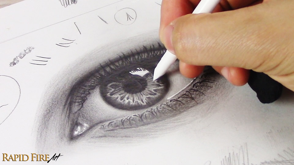 example of using a stiff blending stump to blend small details in an eye drawing